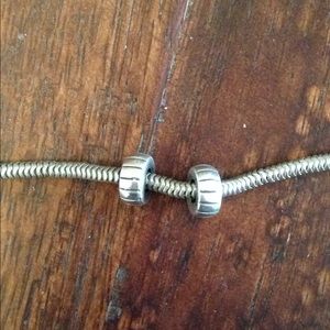 Charm bracelet spacers